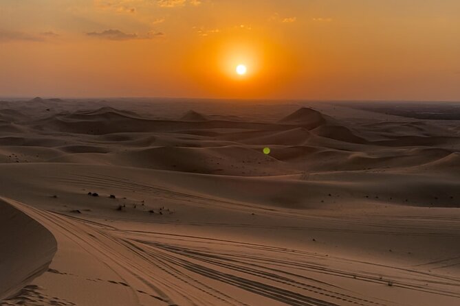 Dubai: Red Dunes, Sandsurf, Camel Ride, BBQ Dinner at Desert Camp - A red-dune ride before sunset