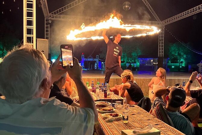 Dubai: Red Dunes, Sandsurf, Camel Ride, BBQ Dinner at Desert Camp - Live entertainment after dark