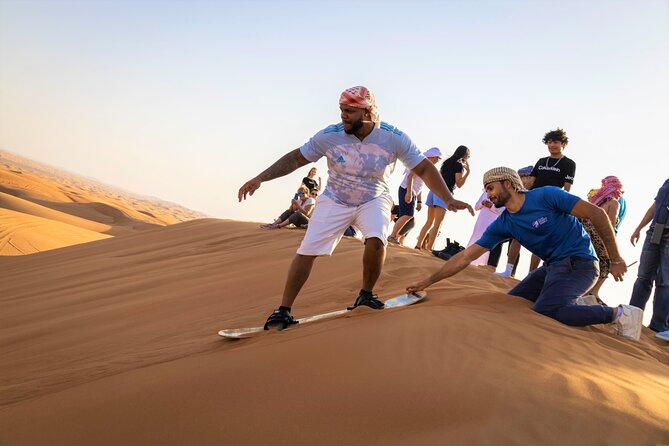 Dubai Red Dunes with Sandboarding, Camel Ride, Falcon & VIP Camp - The red dunes make this more than a city excursion