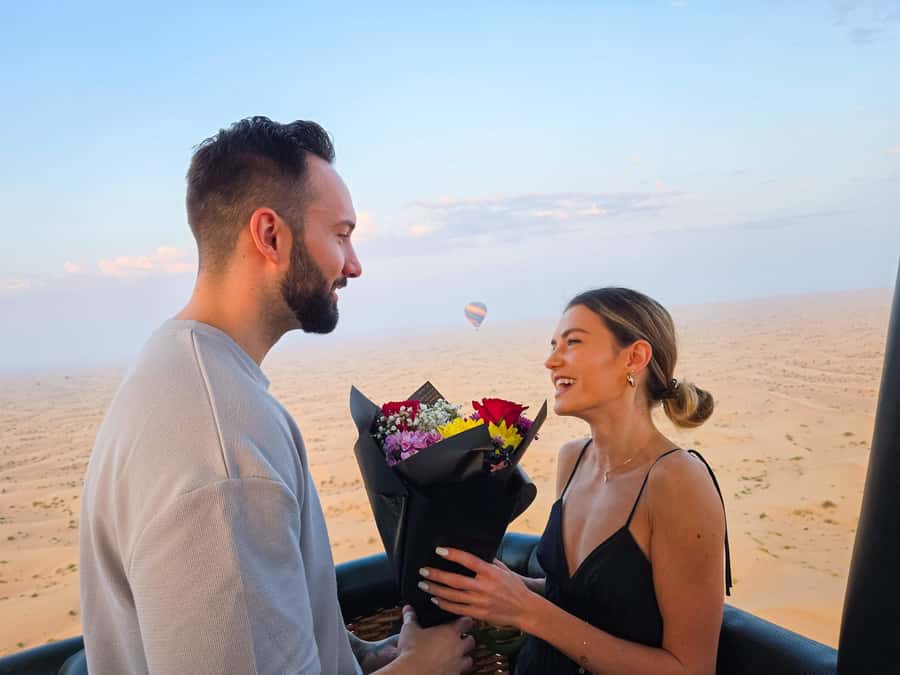Dubai: Sunrise Hot Air Balloon Flight, Breakfast, Camel Ride - The falcon photo has a narrow window