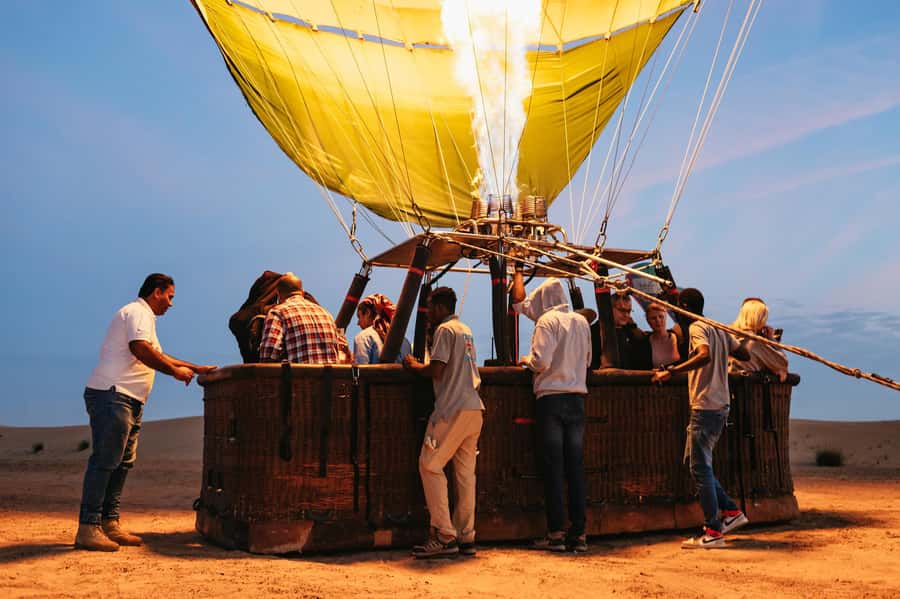 Dubai: Sunrise Hot Air Balloon Tour Over the Desert - Rising over dunes, mountains, and morning light
