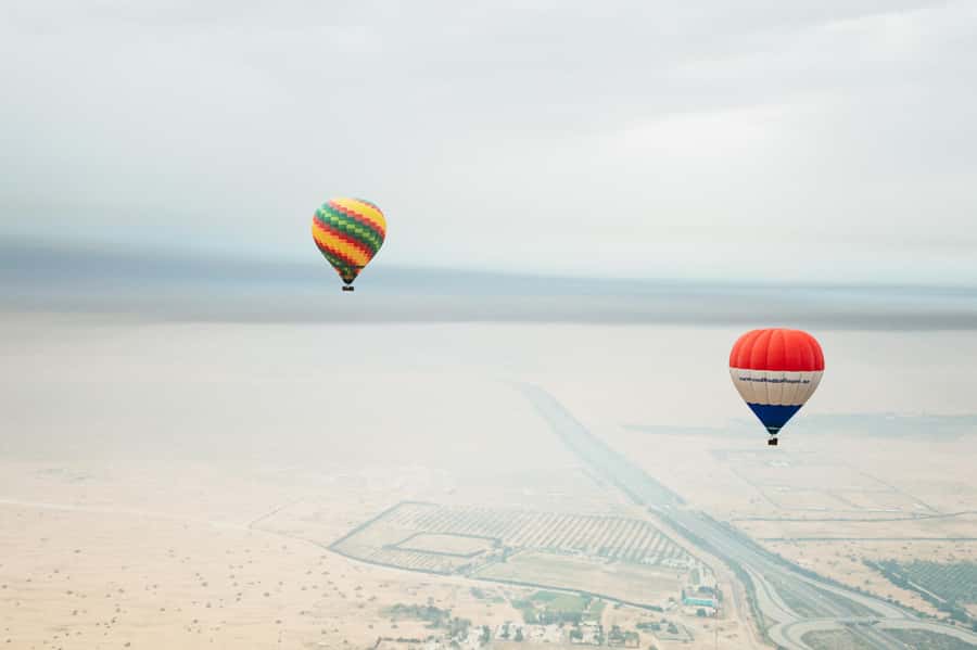 Dubai: Sunrise Hot Air Balloon Tour Over the Desert - What the $280 price really covers