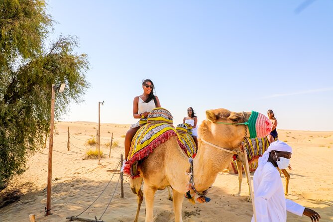 Dubai: Sunset Camel Trek, Al Khayma Camp, Stargazing & BBQ - Entering Al Khayma Camp with coffee and dates