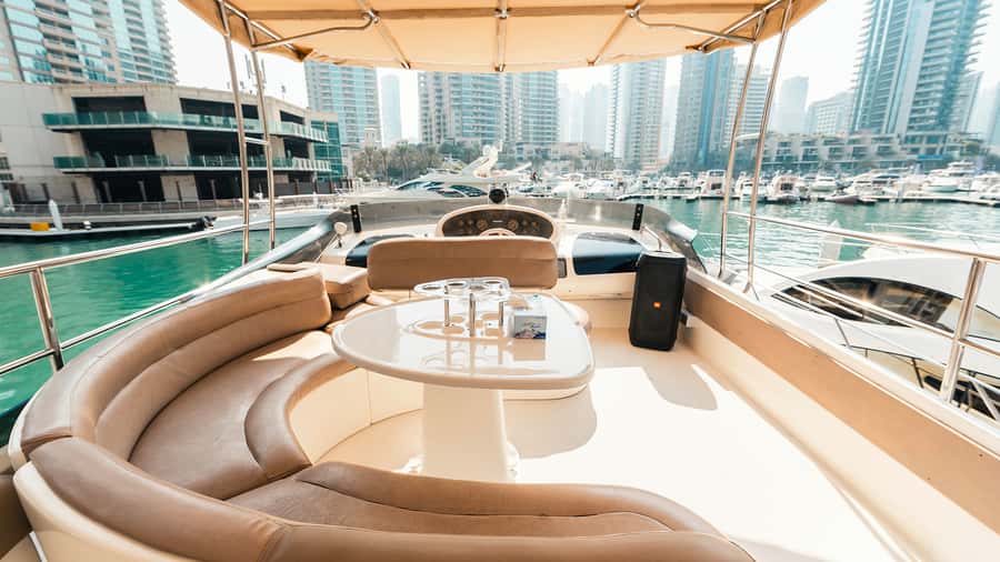 Dubai: Sunset & Night Cruise with Bites and Drinks - Comfort, clothing, and the shared-boat reality