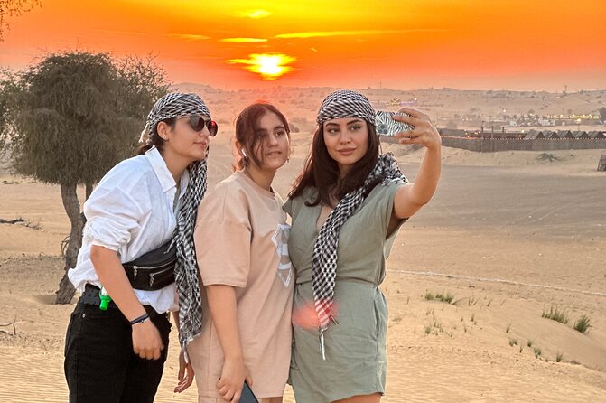 Dubai Sunset Red Dune Desert Safari, Sandboarding and Camel Ride - Sandboarding gives you a hands-on desert activity