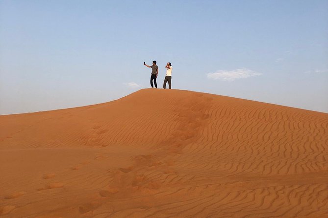 Dubai: Unique SUNSET 4WD Red Dunes Safari - A short camel ride with a very different rhythm