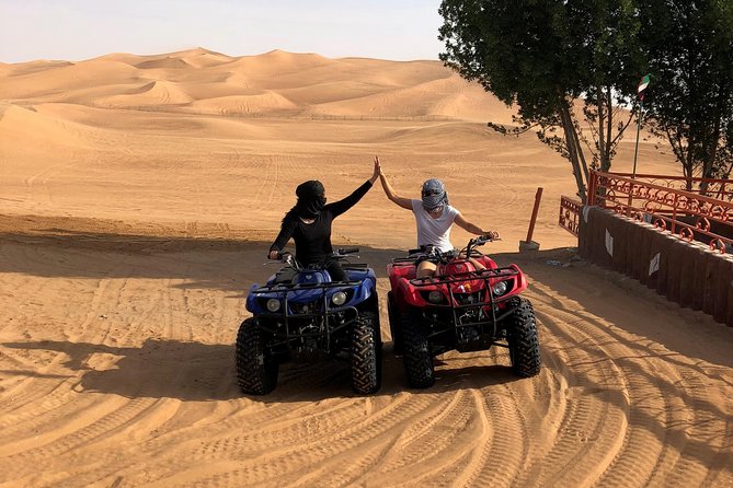 Dubai: Unique SUNSET Quad Bike Red Dunes Safari - Why Lahbab makes a better sunset setting