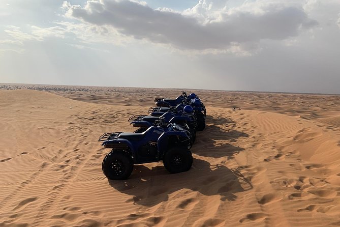 Dubai: Unique SUNSET Quad Bike Red Dunes Safari - Sunset photography from the dunes