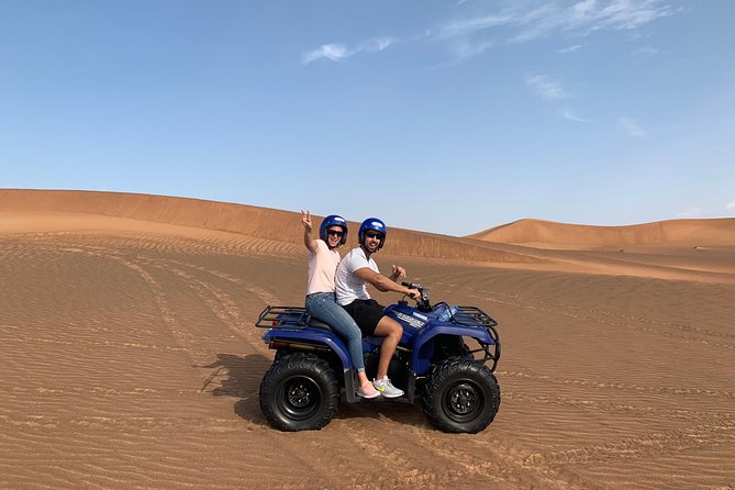 Dubai: Unique SUNSET Quad Bike Red Dunes Safari - What the $99 price really covers