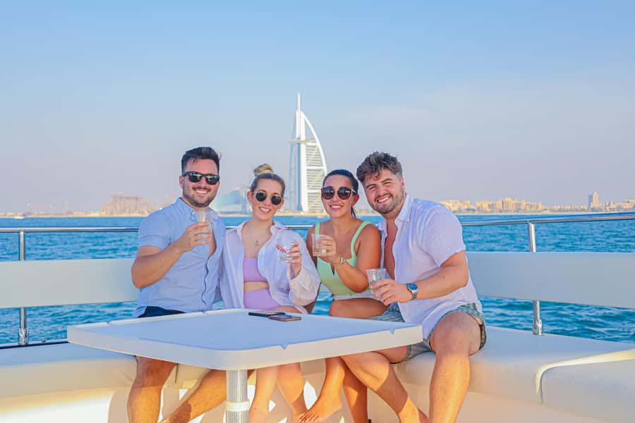 Dubai Waves & Dunes: Luxury Yacht Cruise w/ Red Dunes Safari - Pickup and the ride to Lahbab