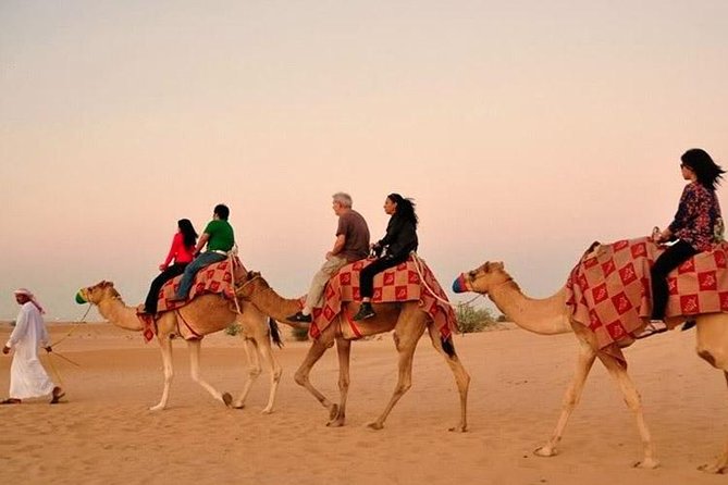 Evening Desert Adventure: Quad Biking, Sandboarding & Camel Ride - Quad Biking Across the Sand