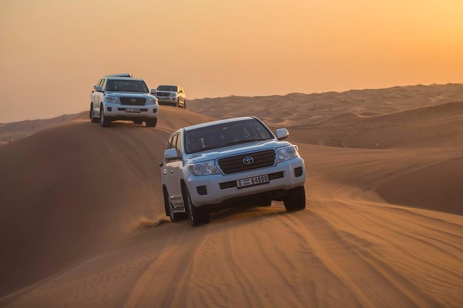 Evening Desert Adventure: Quad Biking, Sandboarding & Camel Ride - Entering the Desert Premium Camp at Al Awir