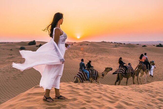 Evening Desert Safari & BBQ With Live Shows,Camel Ride,Falcon pic - A short camel ride with a Bedouin connection