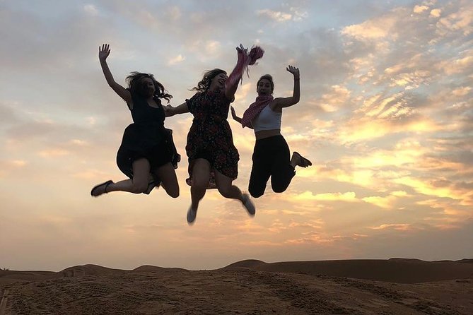 Evening Desert Safari & BBQ With Live Shows,Camel Ride,Falcon pic - Sandboarding and the high-dune photo stop