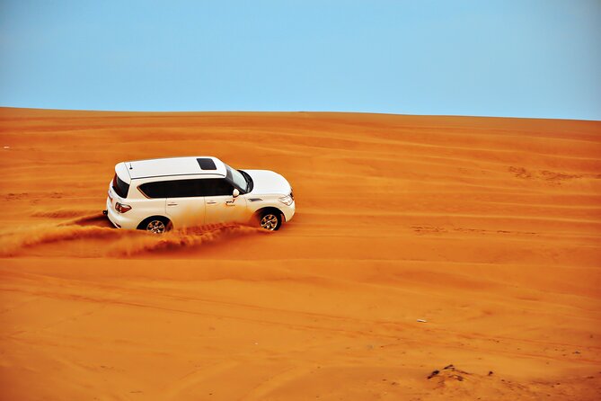 Evening Desert Safari Tour With Dinner & Entertainment - Dune bashing across Lahbab