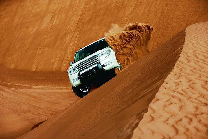 Evening Desert Safari with Belly Dance and BBQ Dinner and Camel Ride - From Dubai Pickup to the Open Desert