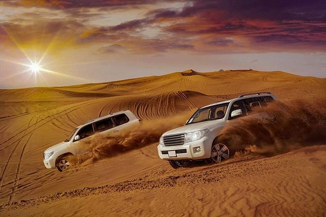 Evening Desert Safari with Belly Dance and BBQ Dinner and Camel Ride - Camel Ride and Sandboarding at the Camp