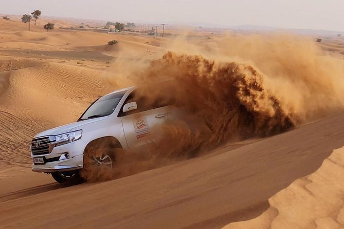 Evening Dubai Safari with BBQ, Dance Shows & Quad Biking optional - Leaving Dubai for Lahbab’s red dunes