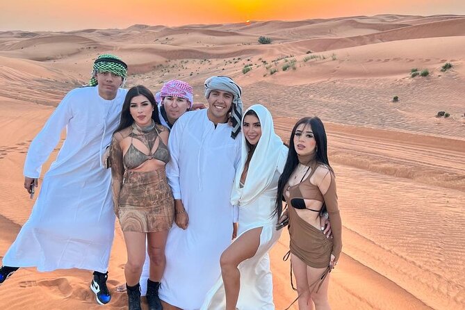 Evening Dubai Safari with BBQ, Dance Shows & Quad Biking optional - Sandboarding and the sunset photo stop