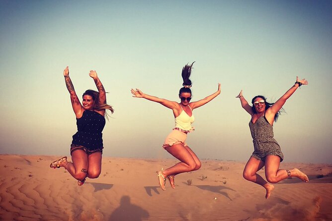 Evening Red Dunes Desert Safari: BBQ Dinner & Adventure Awaits! - A short camel ride and traditional camp activities