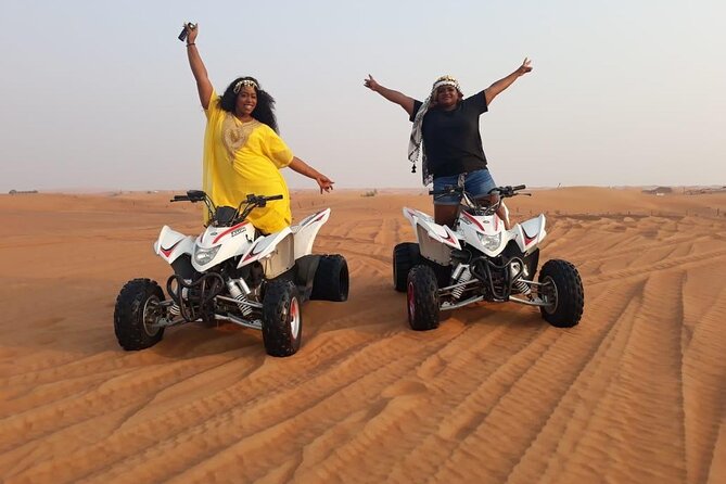 Evening Red Dunes Safari with Quad Biking, BBQ Dinner & LiveShows - Camel riding starts the desert portion