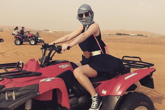 Exciting Morning Desert Safari & Thrilling Quad Bike Ride - Taking control on a quad bike