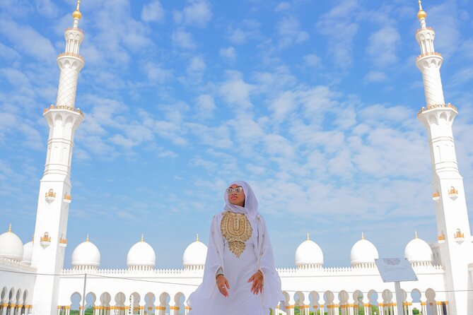 From Dubai: Abu Dhabi Day Tour with Grand Mosque & Louvre Museum - Etihad Towers, Emirates Palace, and the Corniche