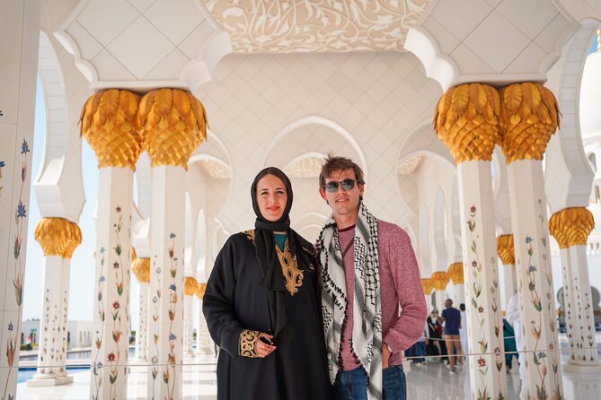 From Dubai: Abu Dhabi Sheikh Zayed Grand Mosque Guided Tour - Courtyards, columns, and the details guides point out