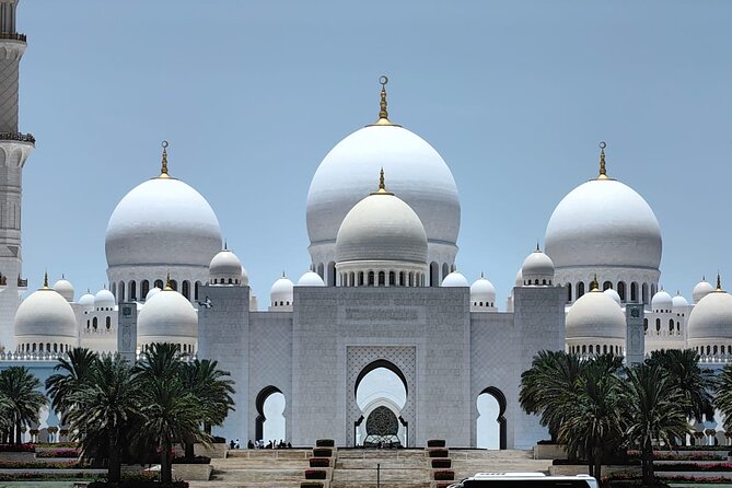 Full Day Abu Dhabi City Tour with Ferrari World - Art, dates, and shopping stops