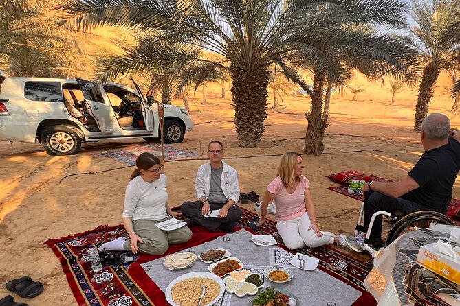 Full Day Liwa Desert Sunset Safari Tour with Lunch at Oasis - Meeting the camels along the way