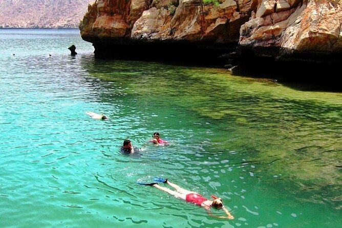 Full Day Musandam Dibba Cruise with Buffet Lunch - Crossing into Oman at Dibba