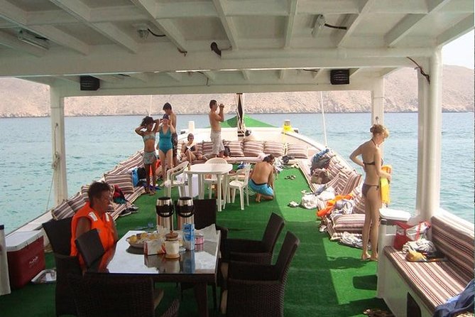 Full Day Musandam Dibba Cruise with Buffet Lunch and Snorkelling - Boarding the dhow at Dibba Port