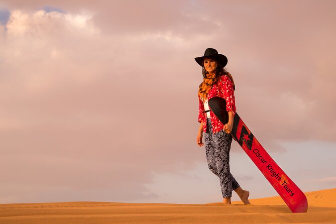 High Red Dunes with Camel Ride, Sandboarding, Falcon Show and VIP BBQ Dinner - Guides make more difference than you might expect