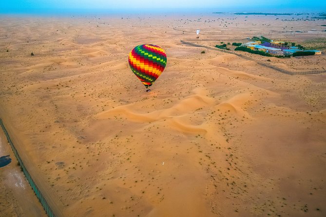 Hot Air Balloon Ride Over Dubai Desert inlcuding Transfers - Falconry after landing