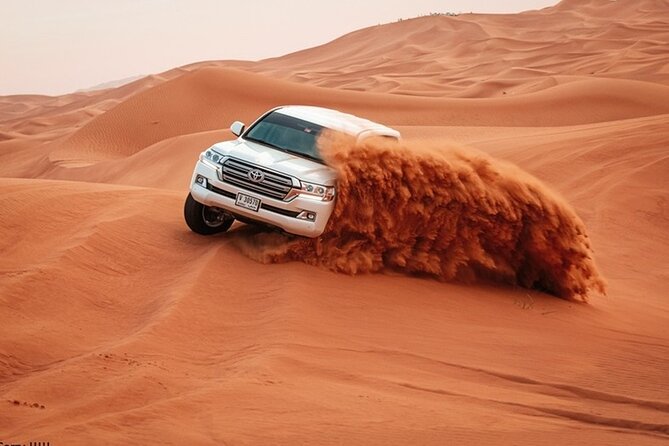 Morning Desert Safari Dubai Tour with Camel Ride and Breakfast - Camel riding, sandboarding, and sunrise photos