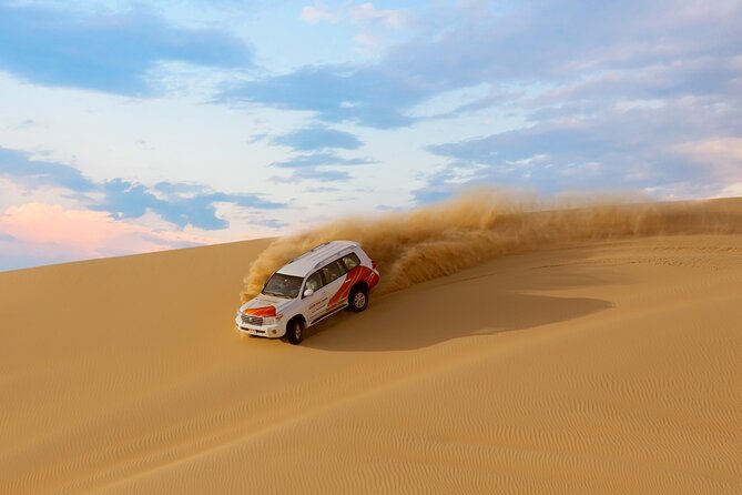 Morning Desert Safari From Abu Dhabi - Sandboarding adds a simple, hands-on activity