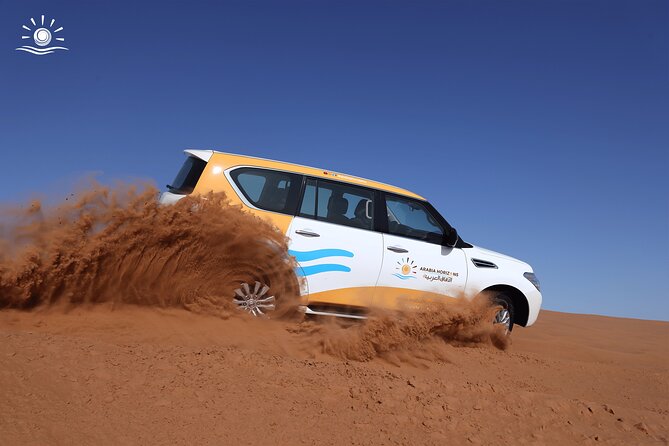 Morning Desert Safari in Dubai with Camel Ride - Sandboarding on the tall dunes