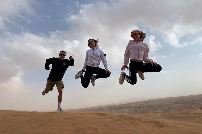 Morning Desert Safari, Quad Bike, Sandboard and Camel Ride - Sandboarding on the Lahbab dunes