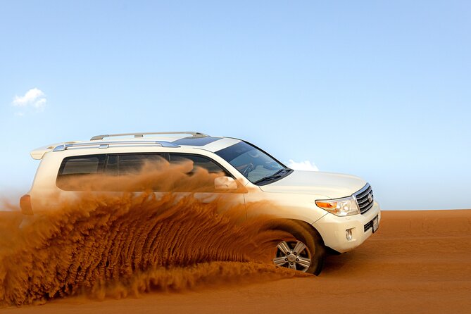 Morning Desert Safari, Quad Bike, Sandboard and Camel Ride - A short camel ride and a real camel-farm stop