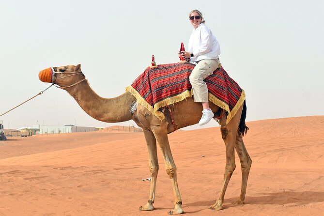 Morning Desert Safari, Quad Bike, Sandboard and Camel Ride - Pickup, timing, and group size