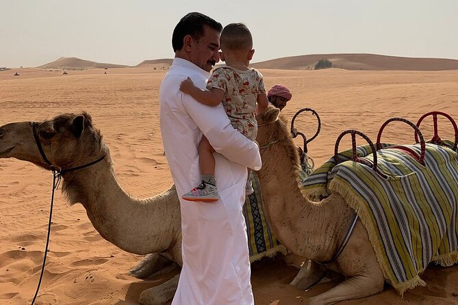 Morning Desert Thrill: Dune Bashing, 30min Quad Bike & Camel Ride - Sandboarding on the same red slopes