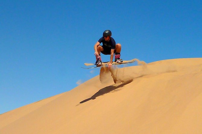 Morning Dubai Desert Dune Bashing and Camel Ride - A traditional camel ride at the desert camp