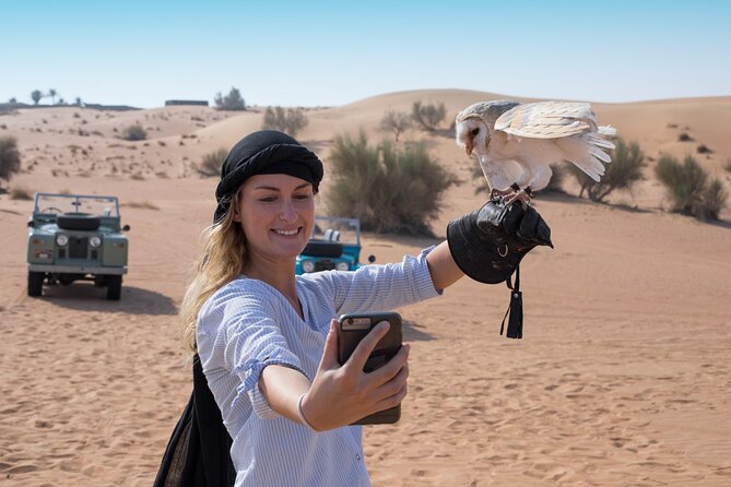 Morning Falconry & Nature Desert Safari with Transfers from Dubai - Getting ready in a traditional headscarf