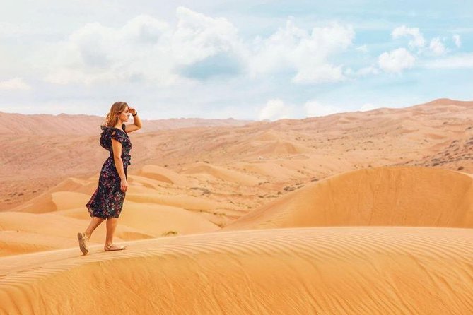 Morning Red Dunes Desert by Quad Bike, Dune Bashing, Camel Ride & Sandboarding - Sandboarding from the high dunes