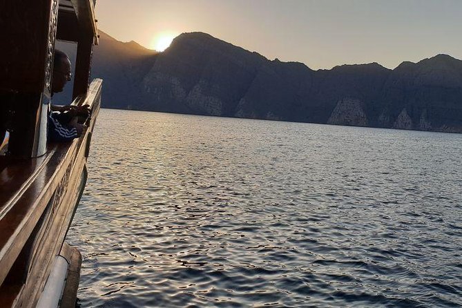Musandam Khasab Day Trip and Dhow Cruise from Dubai - Dolphin watching from the bow