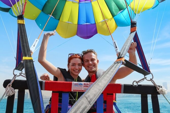 Parasailing in Dubai with Palm Jumeirah and JBR Beach views - The parasail flight above Dubai’s coast