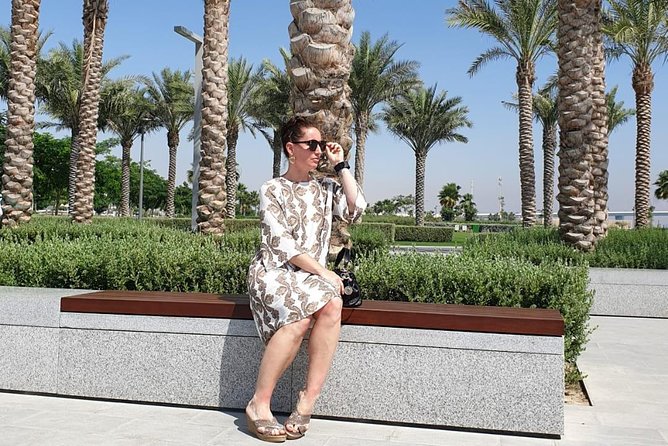 Premium Abu Dhabi Half Day Tour from Dubai - The Corniche shows Abu Dhabi at street level