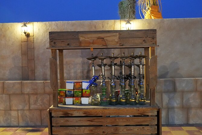 Premium Deluxe Dubai Safari with Camel Ride, Sandboard & BBQ - Arabian drinks and a buffet dinner