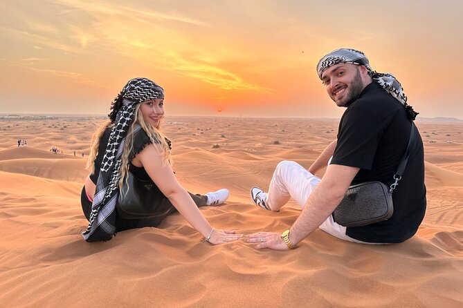 Premium Desert Safari Dune Buggy Camel Ride Sandboard & BBQDinner - The desert camp: camels, falcons, henna, and refreshments