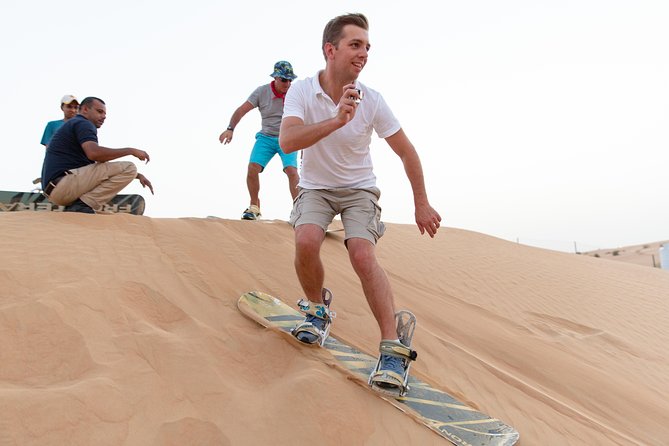 Premium Dubai Desert Safari with BBQ Dinner in the Red Dunes - Dune bashing on high red sand